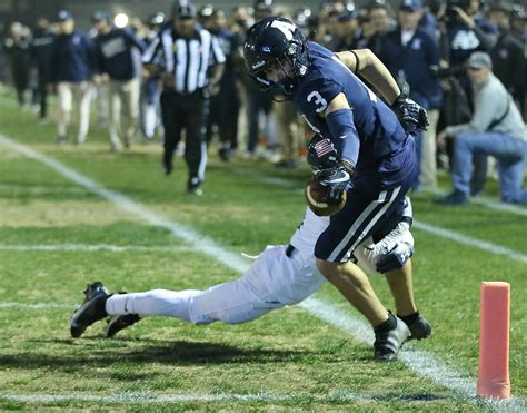 Newport Harbor Football Cant Keep Up With Aquinas In Cif Socal Divsion