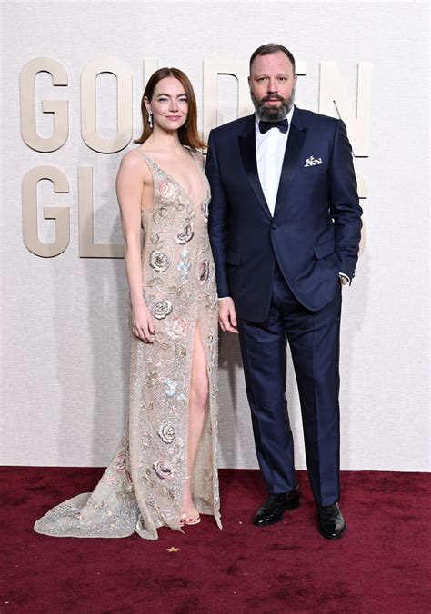 Emma Stone Goes For Gold In Shiny Strappy Heels At Golden Globes 2024