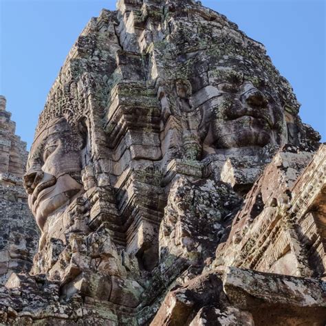 Image Of The Bayon Temple S Towers Showcasing Intricate Stone Human