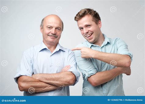 Senior Father Is Proud Of His Mature Son Stock Photo Image Of Care
