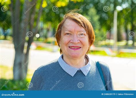 Portrait Of Positive Mature Woman Standing Outdoors Stock Image Image Of Face Adult