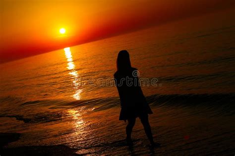 Silhouette of a Lady Running by the Sea Stock Photo - Image of enjoy ...