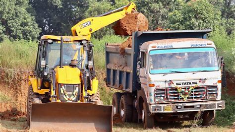 JCB 3dx Backhoe Loading Brown Mud In Tata 2518 Ex Truck And Tata 10