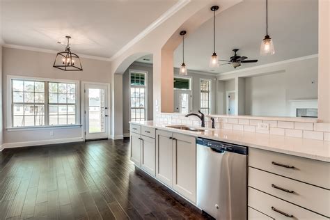 Beautiful Open Concept Kitchen With Stainless Steel Appliances Granite Countertops And Off