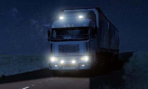 Premium Photo | Truck on a roadway on background of the starry night sky