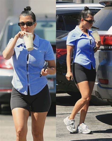 Kourtney Kardashian Shows Off Her Legs In Biker Shorts And A T Shirt As