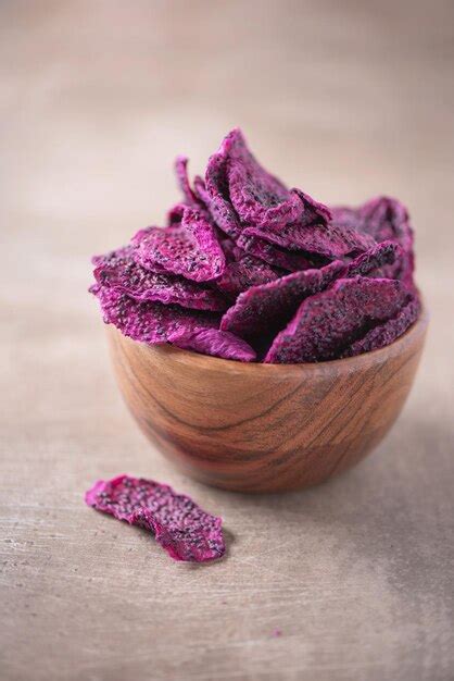 Premium Photo Dried Slices Of Pink Dragon Fruits Pitaya In Wooden