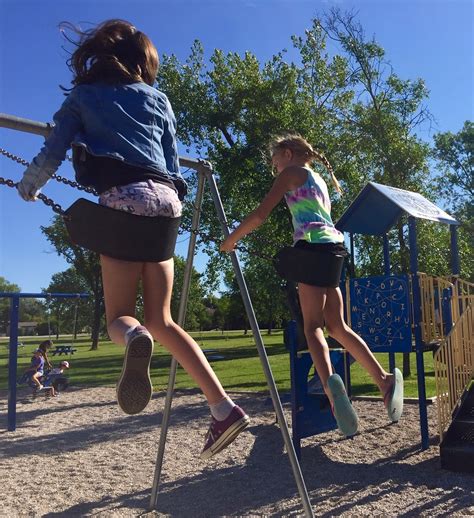 Kids swinging at park – Rural Municipality of St. Clements