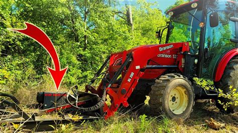 Front Mounted Brush Cutter On A Compact Tractor Youtube