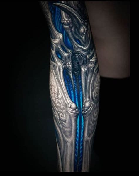 Biomechanical Leg Tattoo Design