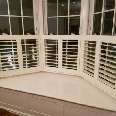 Cafe Style Shutters For Turret Bay Windows In Victorian Apartment In