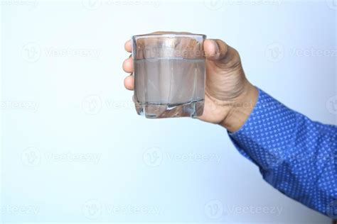 Holding Dirty Glass Of Water Stock Photo At Vecteezy