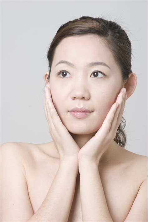 Smiling Asian Girl With A Finger Touching Her Chin Stock Image Image Of Cheerful Health 13834543