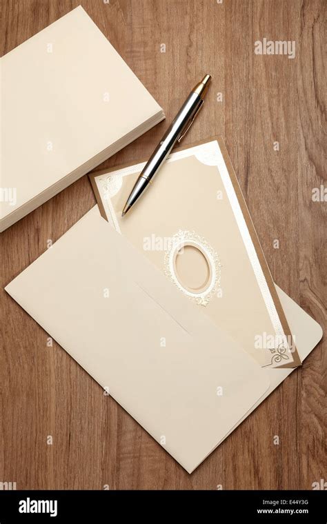 Invitation Card With Pen On Wooden Table Stock Photo Alamy