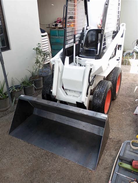 TCM Bobcat Mini Loader, Commercial & Industrial, Construction Tools & Equipment on Carousell