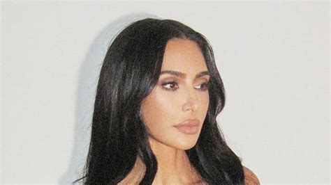 Kim Kardashian Shows Off Her Tiny Waist In Nothing But A Sheer Bra And Matching Underwear For