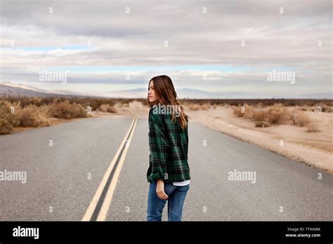 Woman Walking On Country Road Hi Res Stock Photography And Images Alamy