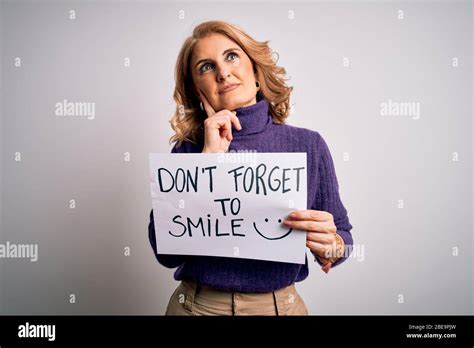 Middle Age Beautiful Blonde Woman Holding Banner Funny Positive Message