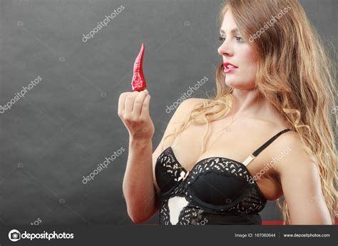 Woman Wearing Lingerie Posing With Chilli Pepper Stock Photo By