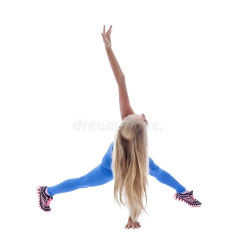Le Studio a Tiré De La Blonde Mignonne Faisant Des Exercices De Forme Physique Image stock