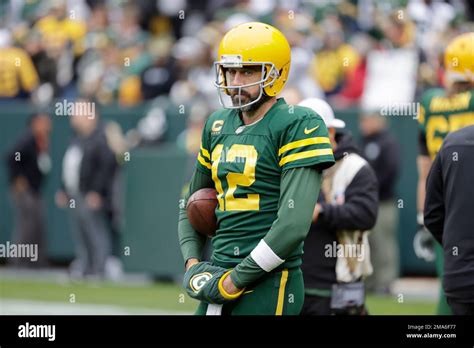 Green Bay Packers Quarterback Aaron Rodgers 12 During An NFL Football