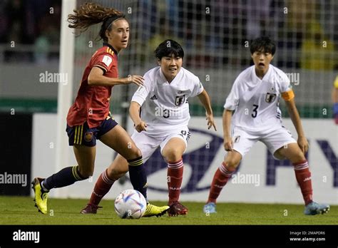 Spain S Julia Bartel Controls The Ball Under The Watch Of Japan S