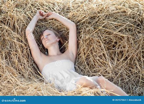 Girl Lying On A Hayloft Royalty-Free Stock Photography | CartoonDealer.com #26157563