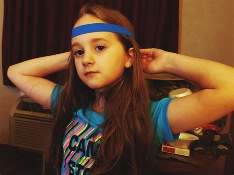 Premium Photo Portrait Of Girl Wearing Headband At Home