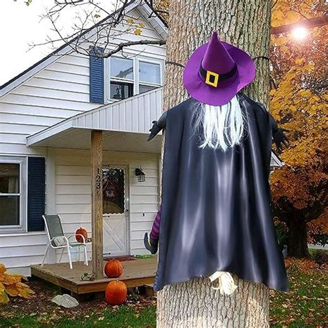 Spooky Witch Flying Into Tree