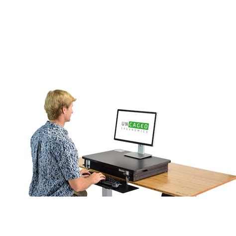 Uncaged Ergonomics Change Desk Standing Desk Riser in the Office ...