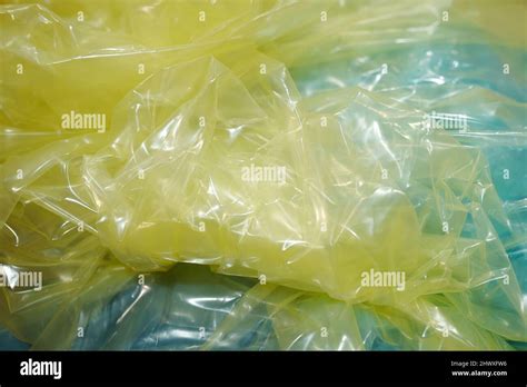 Part Of Crumpled Cellophane Of Yellow Color Prepared For Wrapping Small