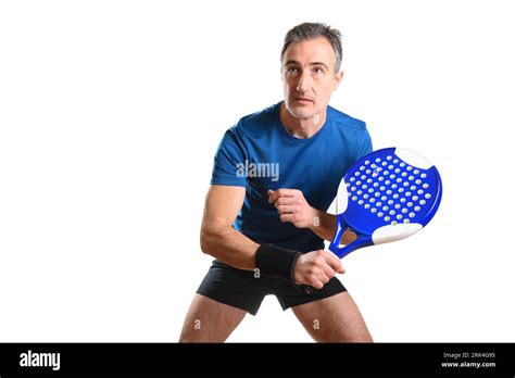 Portrait Of Man Playing Padel Tennis In Position To Hit A Backhand Ball