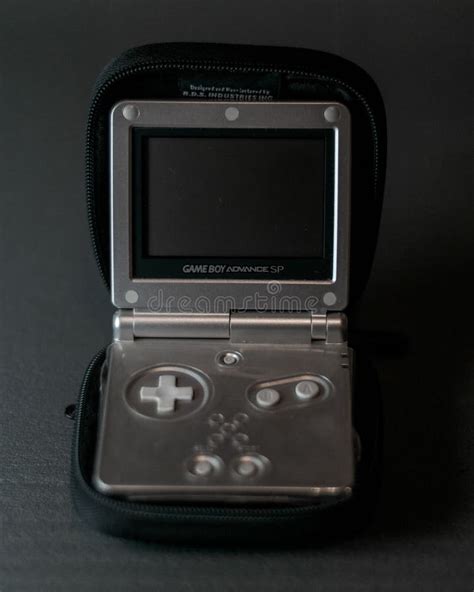 Vertical Shot Of A Vintage Gray Game Boy Advance Sp With A Case On A