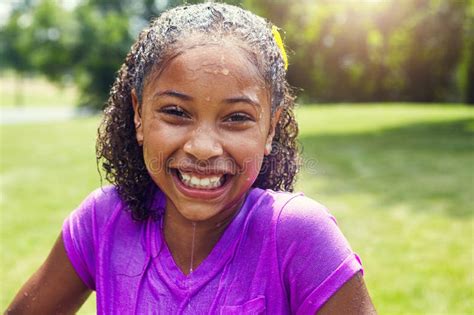 She Loves Playing with Water Balloons. Portrait of an Adorable Little ...