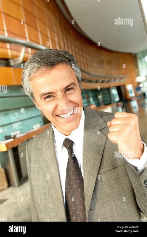 Mature Businessman Smiling In Office Portrait Stock Photo Alamy
