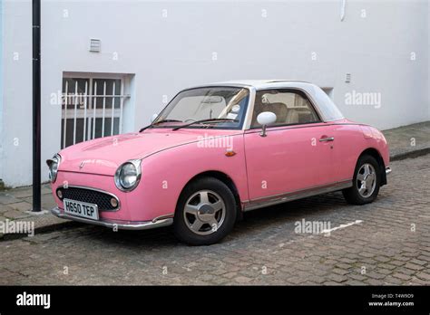 Pink nissan figaro hi-res stock photography and images - Alamy