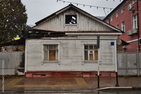 Old burned down house on the street Stock Photo | Adobe Stock