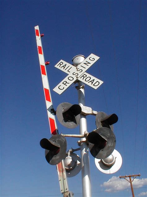 man  law warning railroad crossing bam