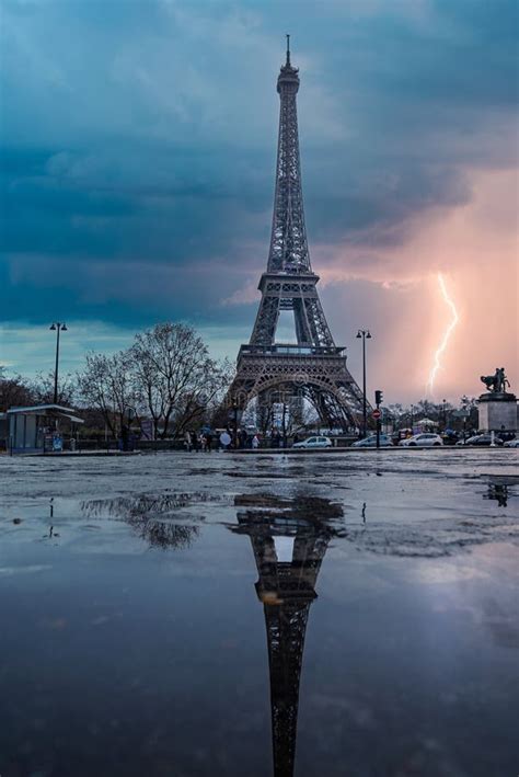 Rainy Weather With Wind And Lightning Near Eiffel Tower Editorial