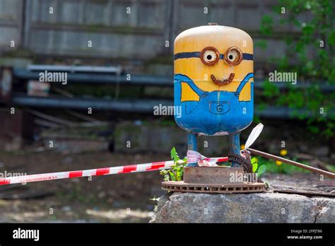 Cartoon character figure made from old gas cylinder Stock Photo - Alamy