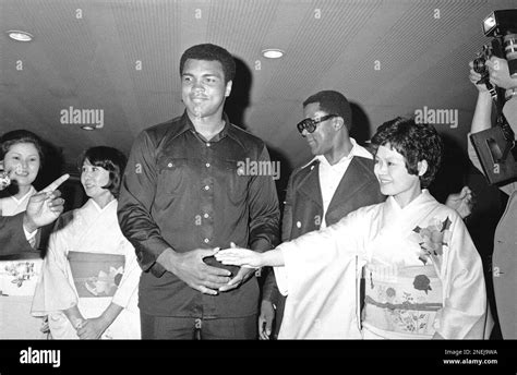 World Heavyweight Boxing Champion Muhammad Ali Shakes Hands With A