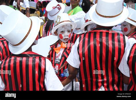 Young masqueraders parade as Minstrel characters during the Traditional Carnival Characters ...