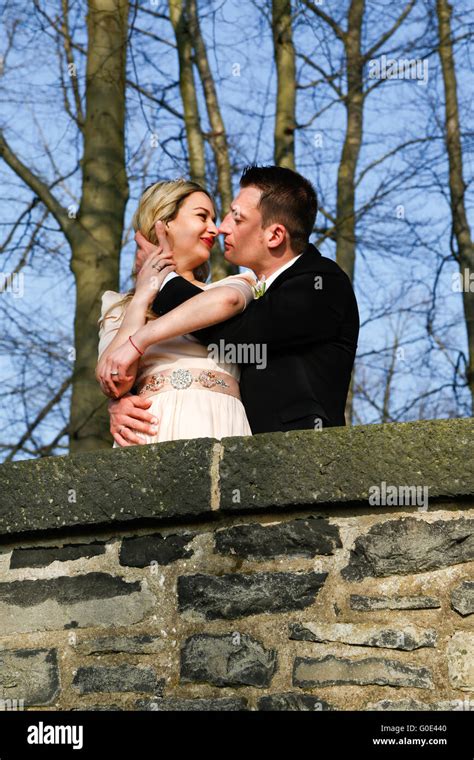 Man Kissing His Wife Stock Photo Alamy