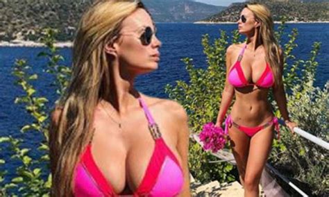 Rhian Sugden Shows Off Her Eye Popping Cleavage In A Tiny Bikini From