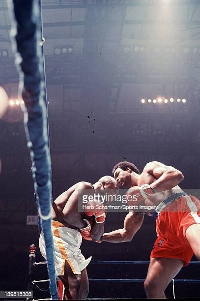 George Foreman Vs Joe Frazier Photos And Premium High Res Pictures