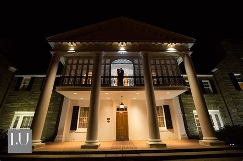 A Gorgeous Night Shot Of The Bride And Groom Sharing An Intimate Moment