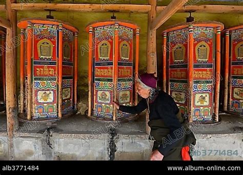 Tibetan Buddhism Tibetan Woman Elderly Woman In The Traditional Chuba