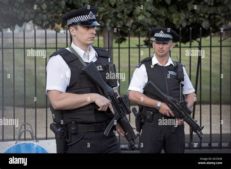 Armed British Police Officers in London England UK Stock Photo - Alamy