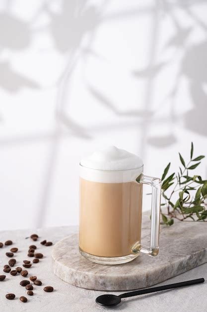 Premium Photo Cappuccino Or Latte With Milk Foam In A Cup With Coffee