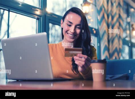 Beautiful Brunette Female Keeping Smile On Her Face Stock Photo Alamy